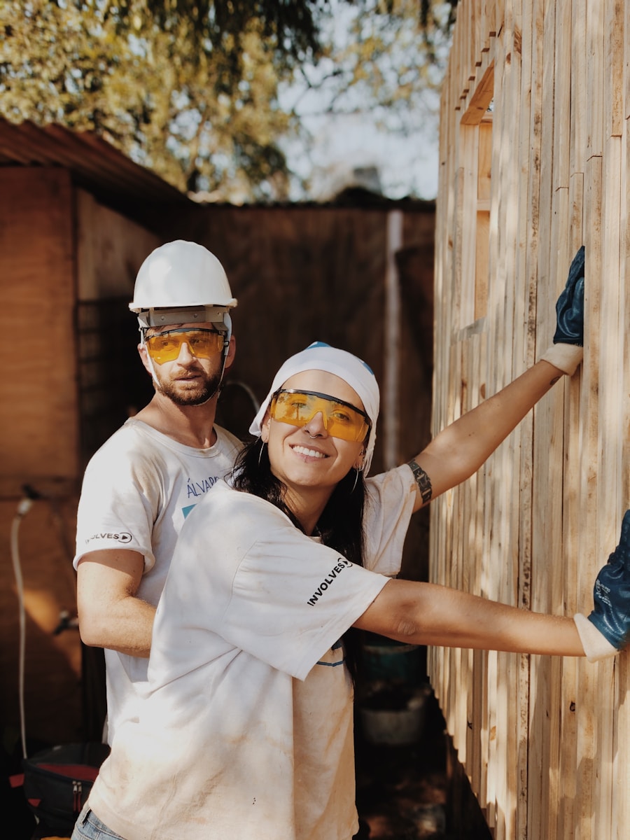 woman in white shirt wearing white helmet performing renovations with homeowners insurance coverage as a precaution